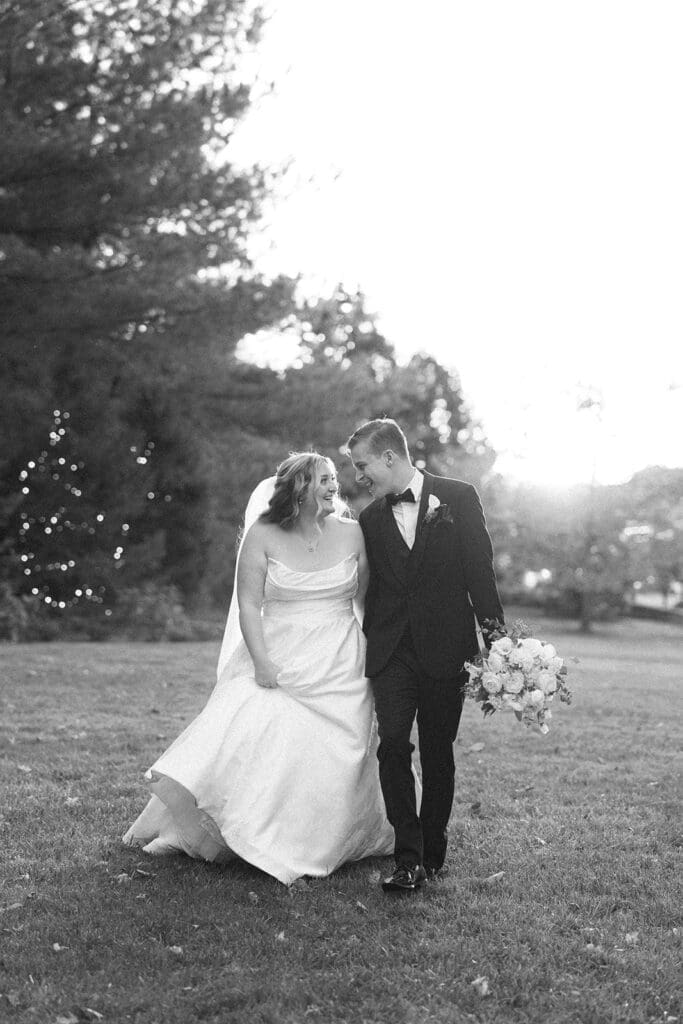 Trey and Magdalene candidly chat with one another at their woodwinds wedding