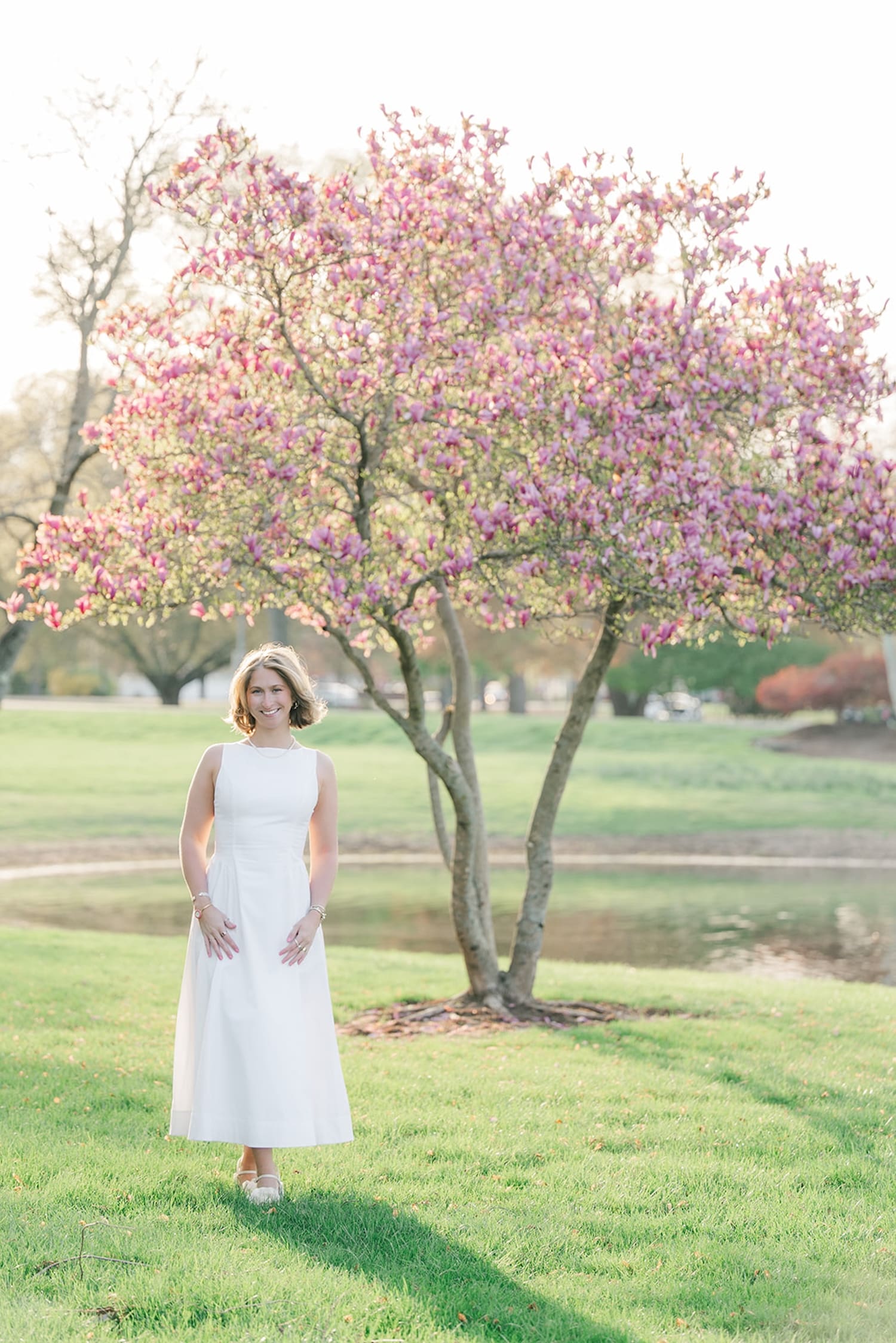 Abby smiles under a tree at Quinnipiac Law School