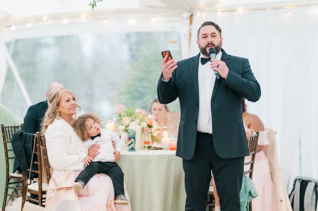 The groom's brother gives a speech. 