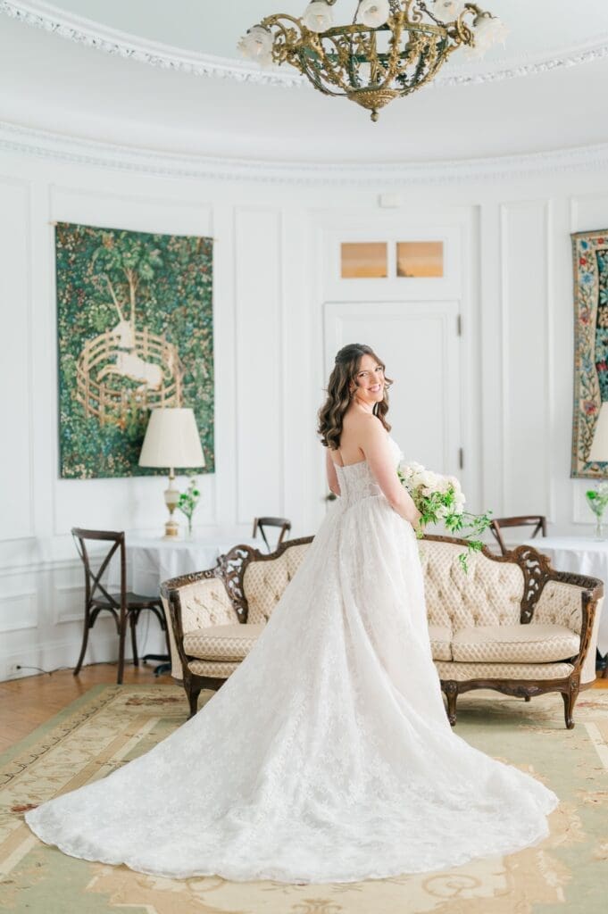 Miranda in the oval room at Aldworth Manor wearing her wedding dress. 