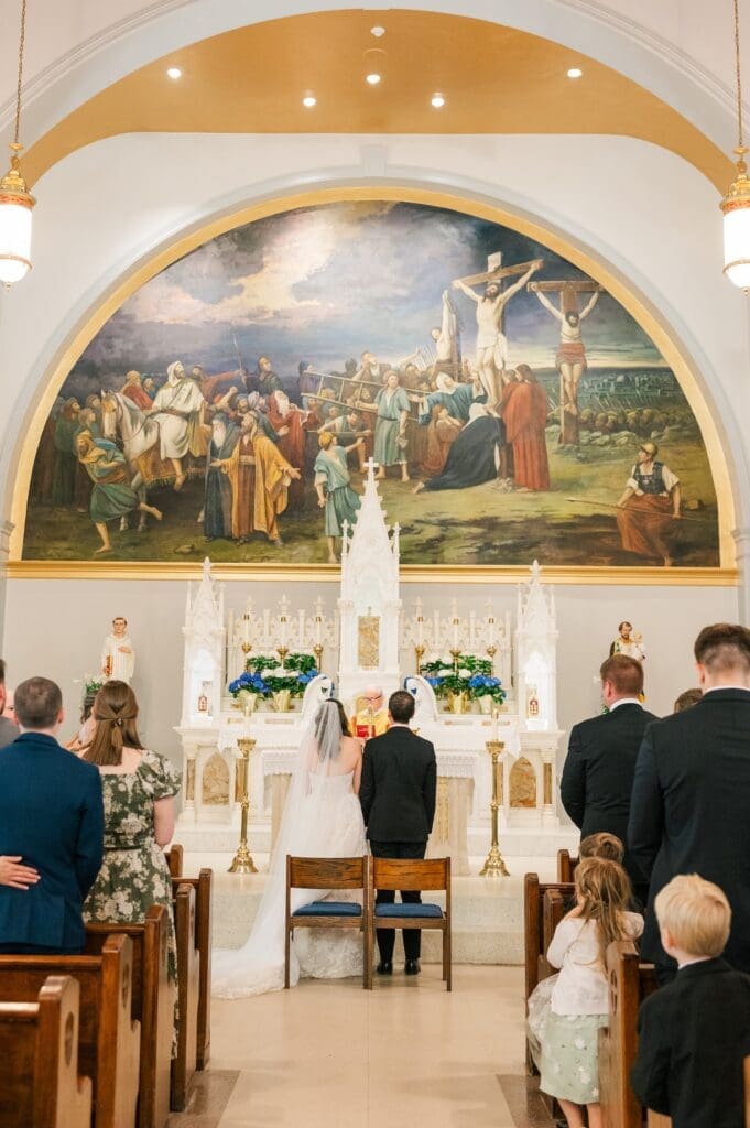 Miranda and Mitch stand next to eachother during their ceremony. 