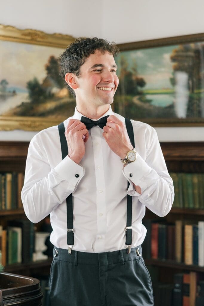 Mitch adjusting his bowtie