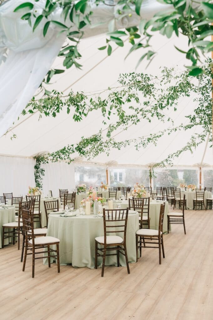 Chairs and tables under the tent at Aldworth Manor. 