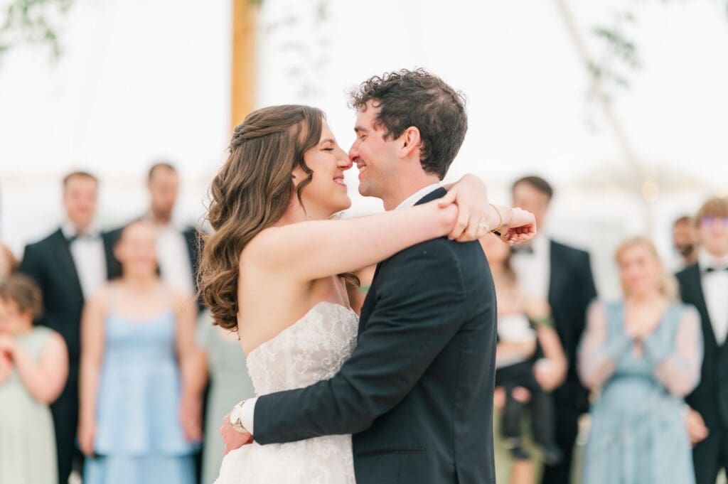Miranda and Mitch nuzzle noses during their first dance. 