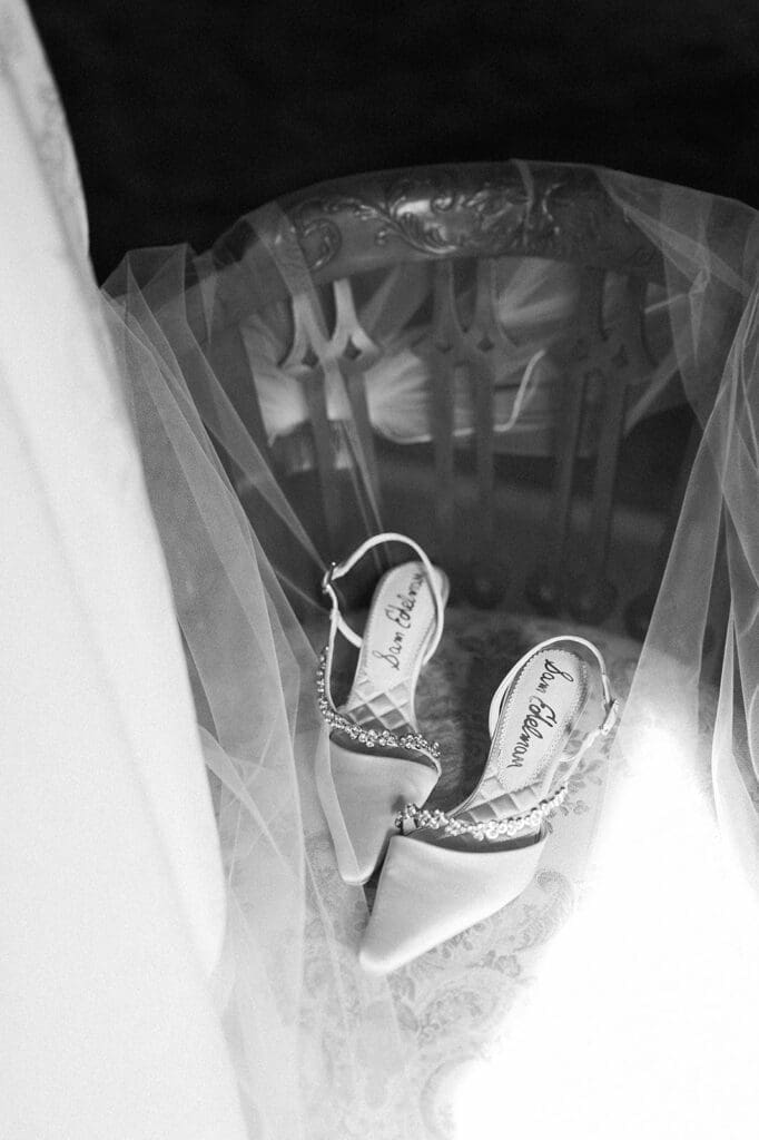 Wedding shoes on a bridal veil. 