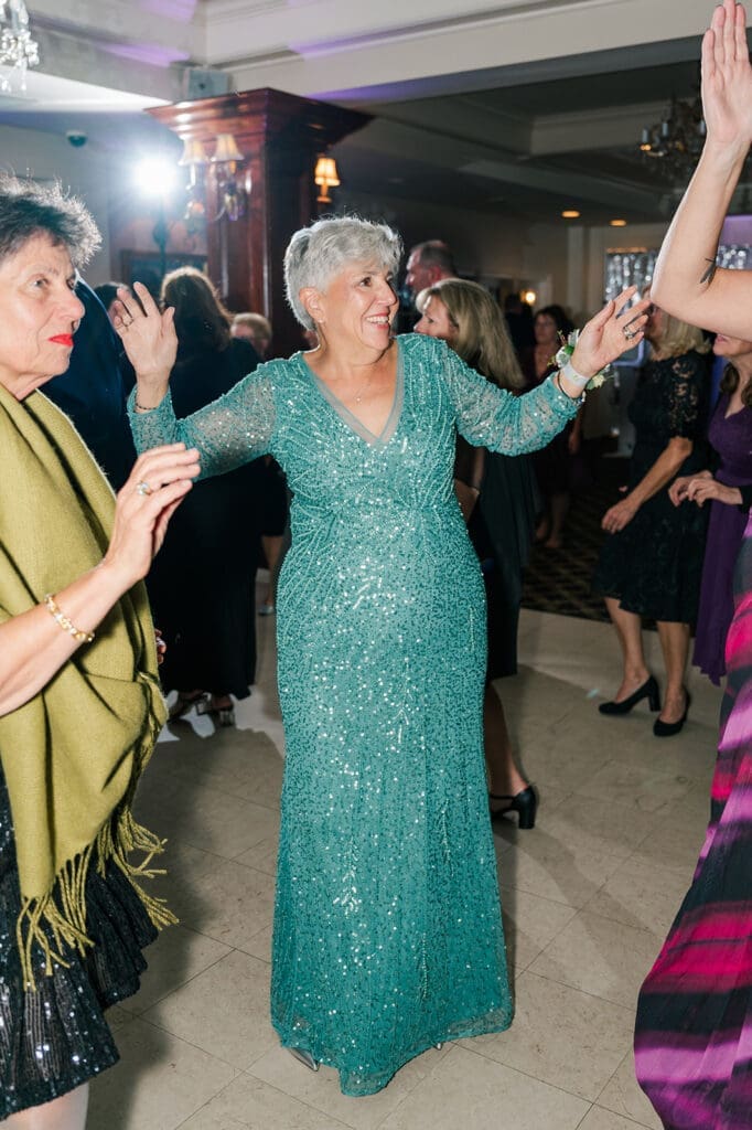 Magdalene's mom dancing on the dance floor 