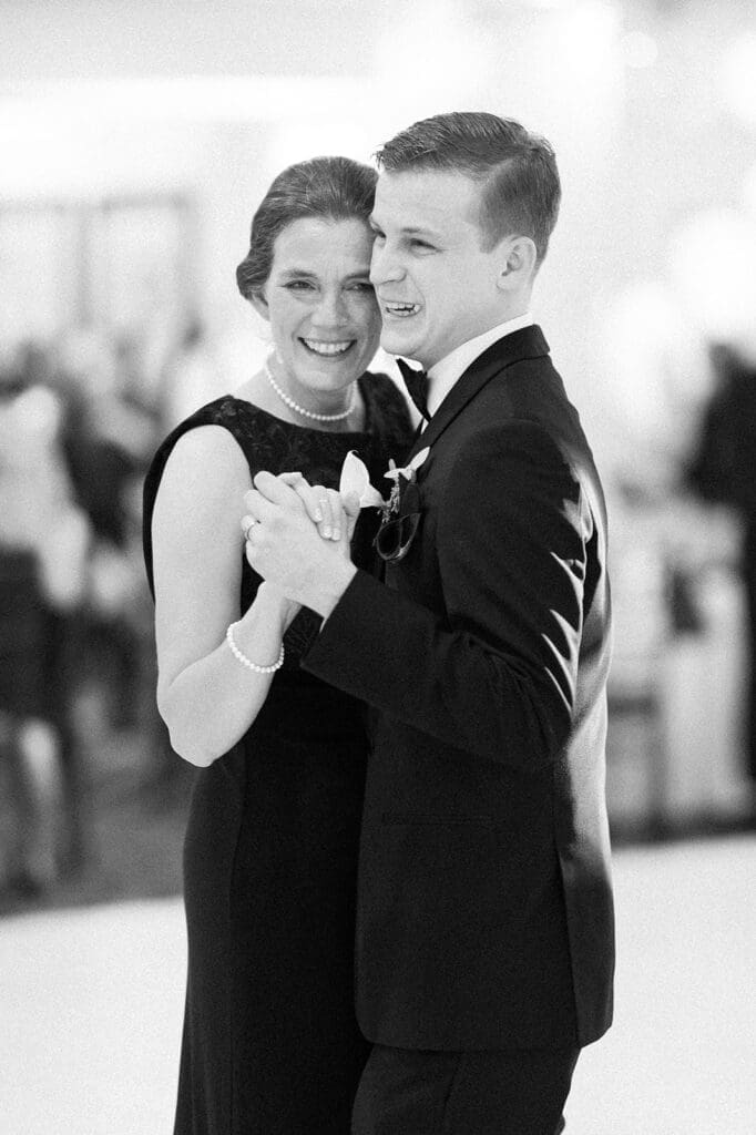 Trey and his mother dance with one another at Woodwinds