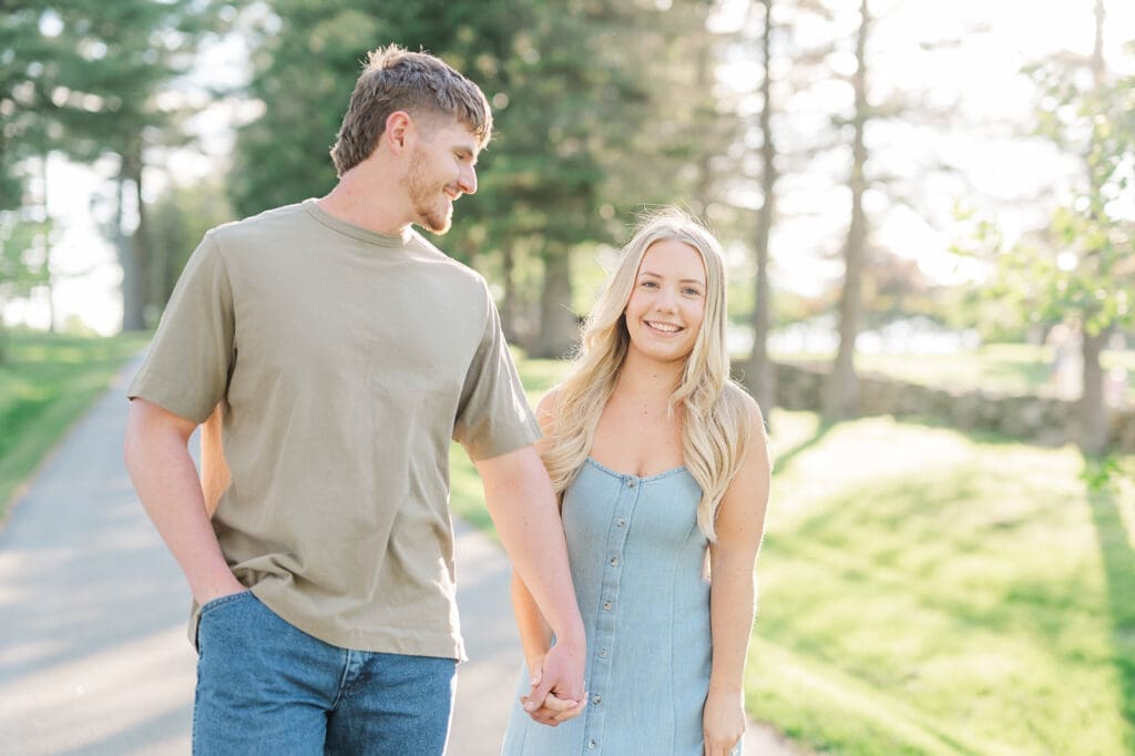 Lois smiles as she walks with George, her fiance.
