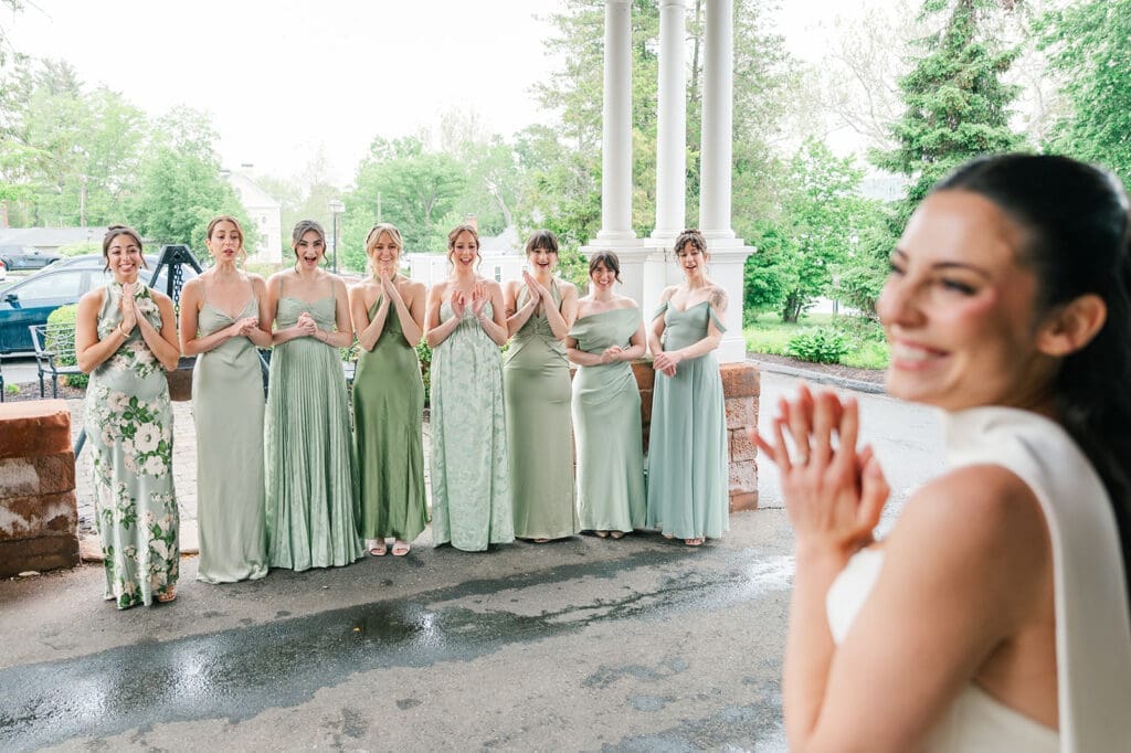 Natalie does a dress reveal with her bridesmaids on her rainy wedding day. 