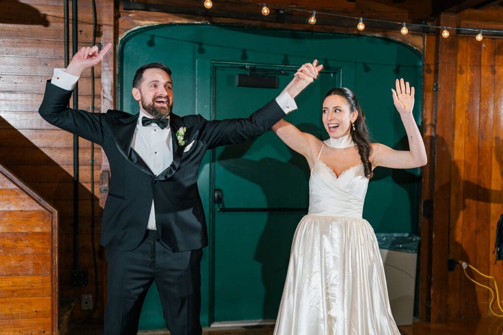 Natalie and Tom dance into the reception as they are announced. 