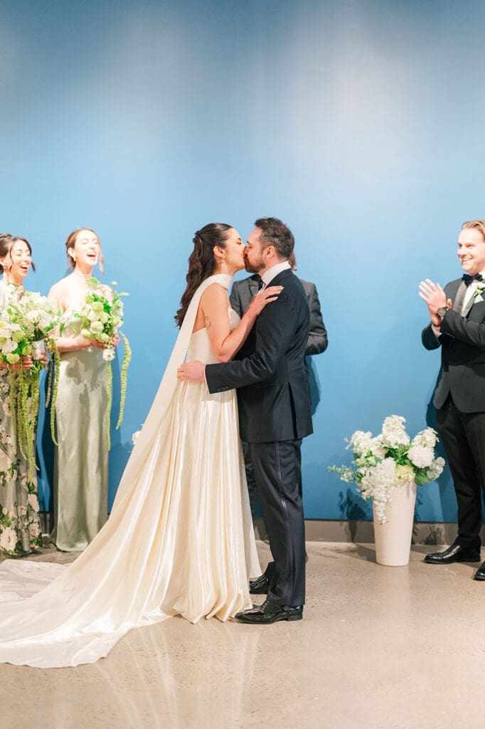 Tom and Natalie share a first kiss with one another. 