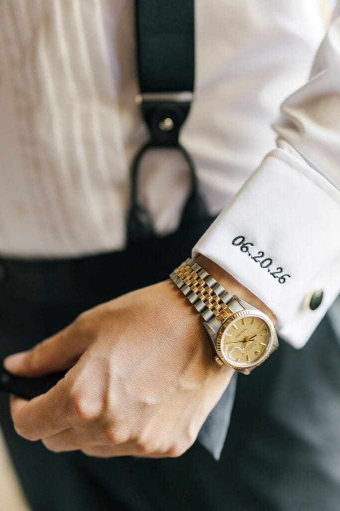 Sang's sleeve which has his wedding date embroidered on it: 06-20-26
