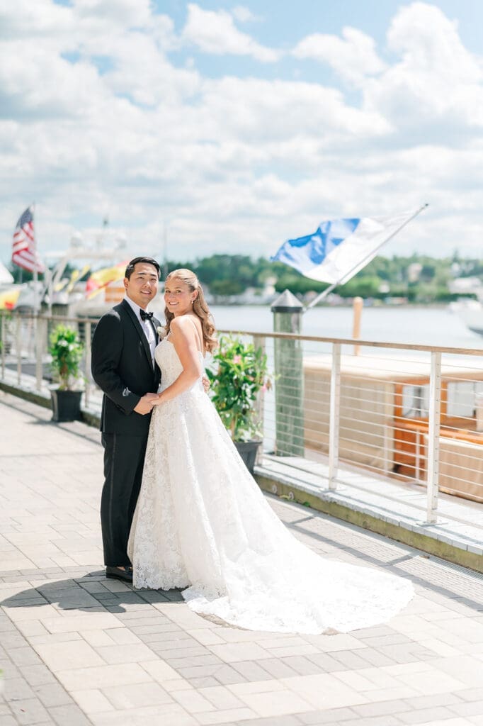 Katie and Sang smile for a wedding portrait at Delamar Greenwich.