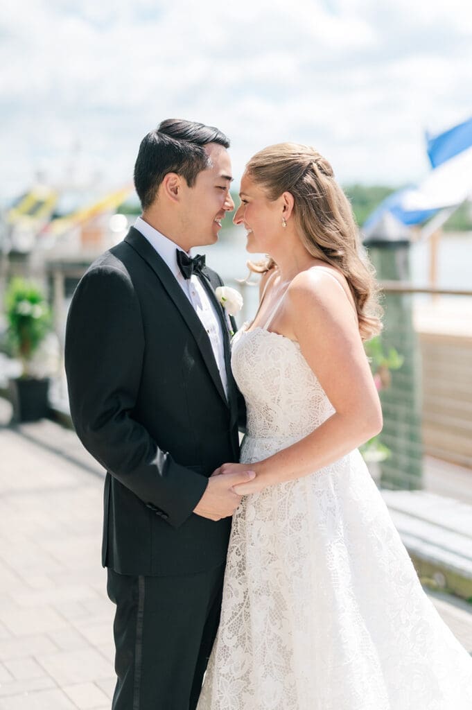 Katie and Sang nuzzle noses for a wedding portrait at Delamar Greenwich.