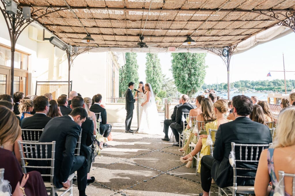 Sang reads vows to Katie during their wedding ceremony. 