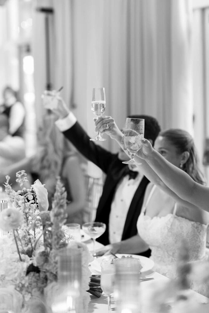 Sang and Katie raise glasses and cheers their guests. 