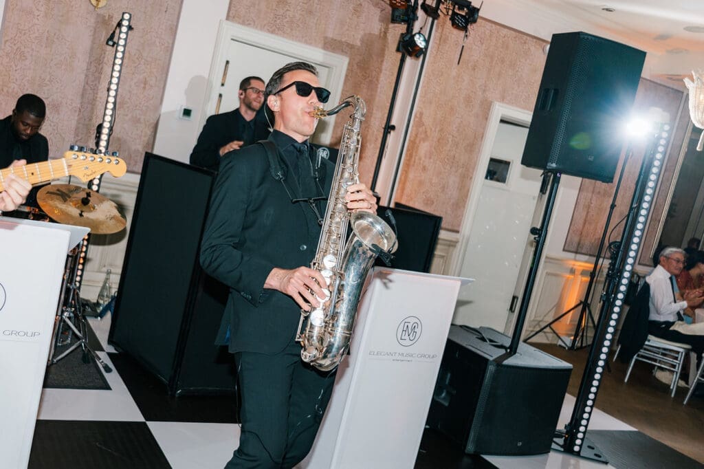 A saxophonist plays music at the reception. 