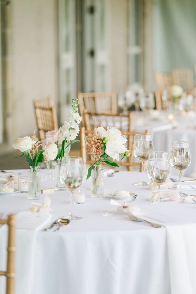 Bud vases on the tables at a wedding reception