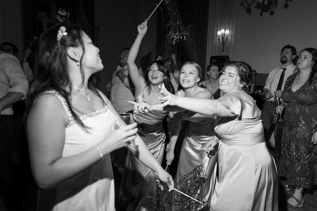 Emily dances with her friends on the dance floor