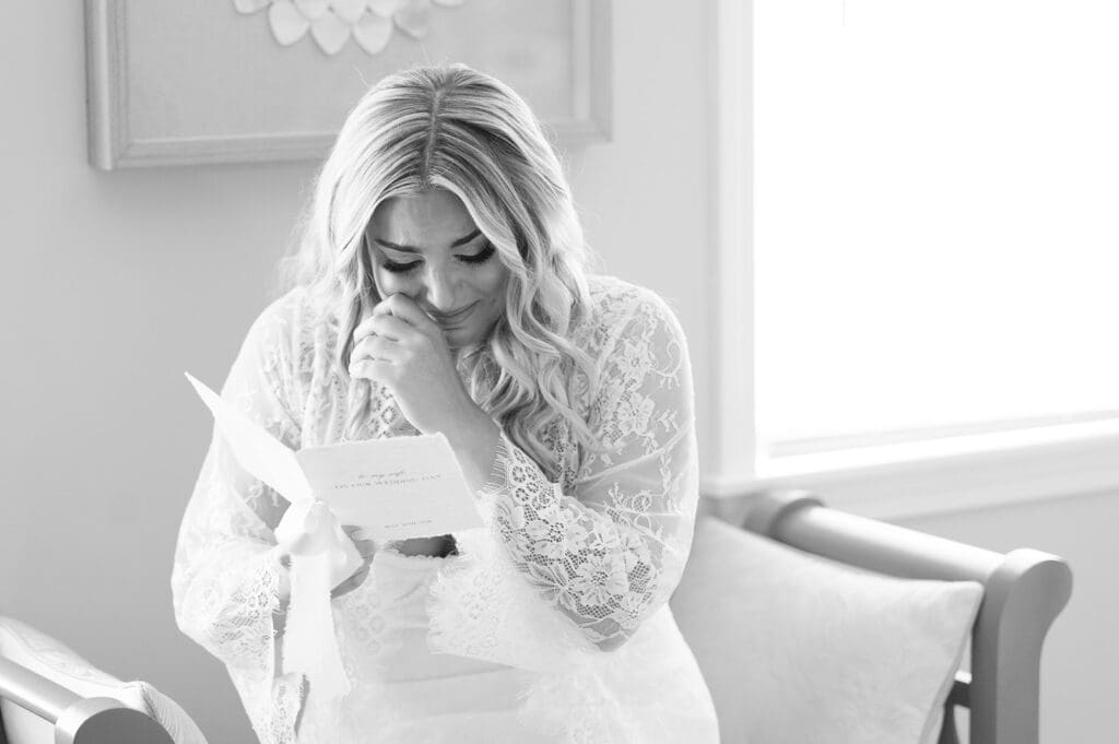 Jacquie wipes away a year as she reads a letter from Thomas. 