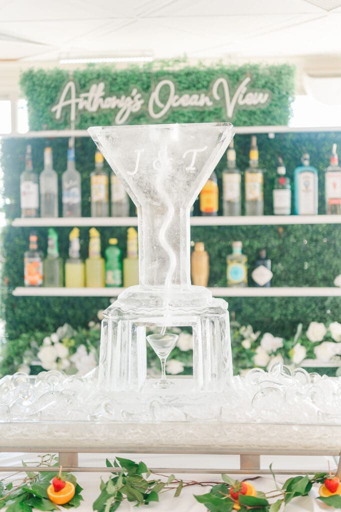 An ice sculpture for martinis that says J & T at Anthony's Ocean View. 
