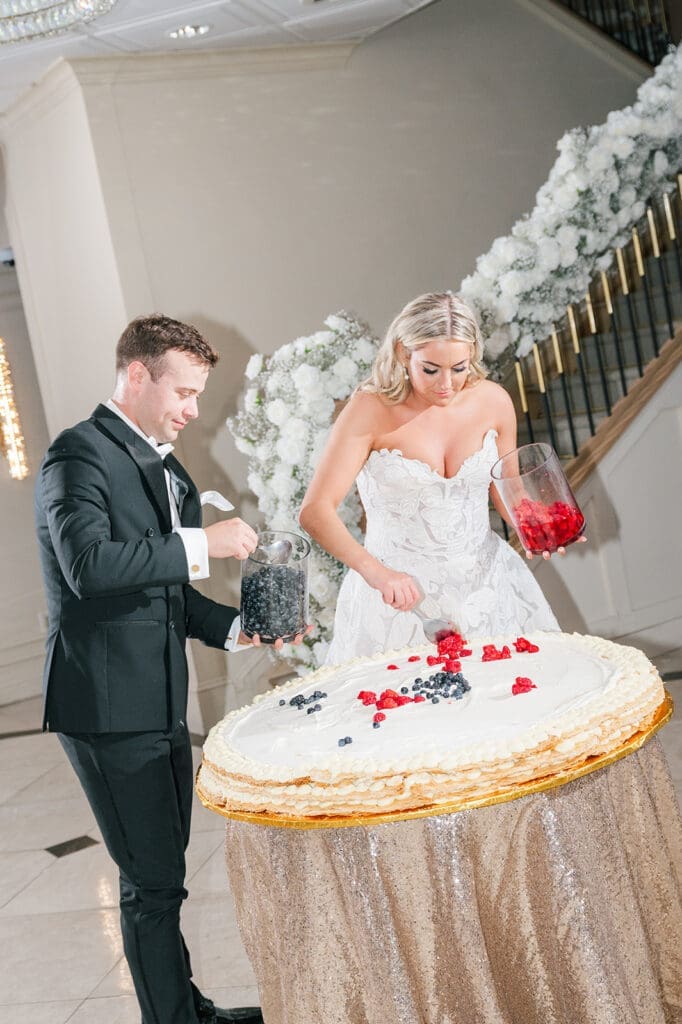 Jacquie and Thomas make their own wedding cake at their Anthony's Ocean View wedding. 