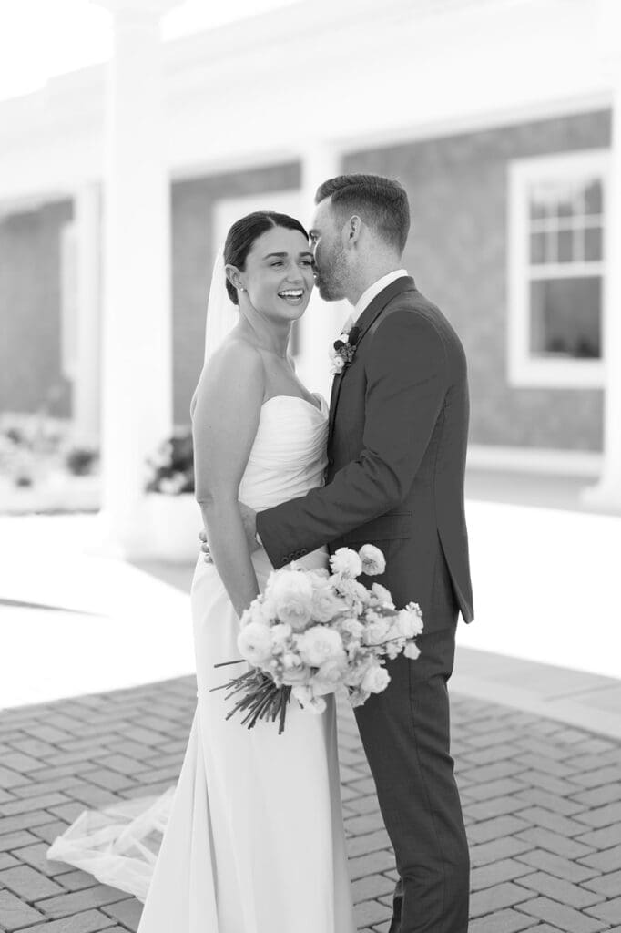 Conor nuzzles into Amy's temple as she smiles