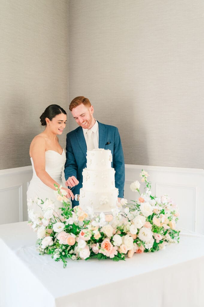 Amy and Conor cut their wedding cake