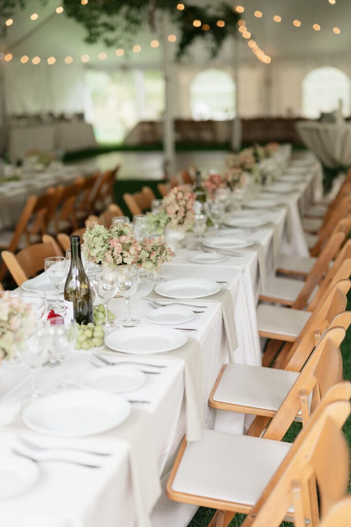 A green and purple wedding tablescape at the Barnstead Inn. 