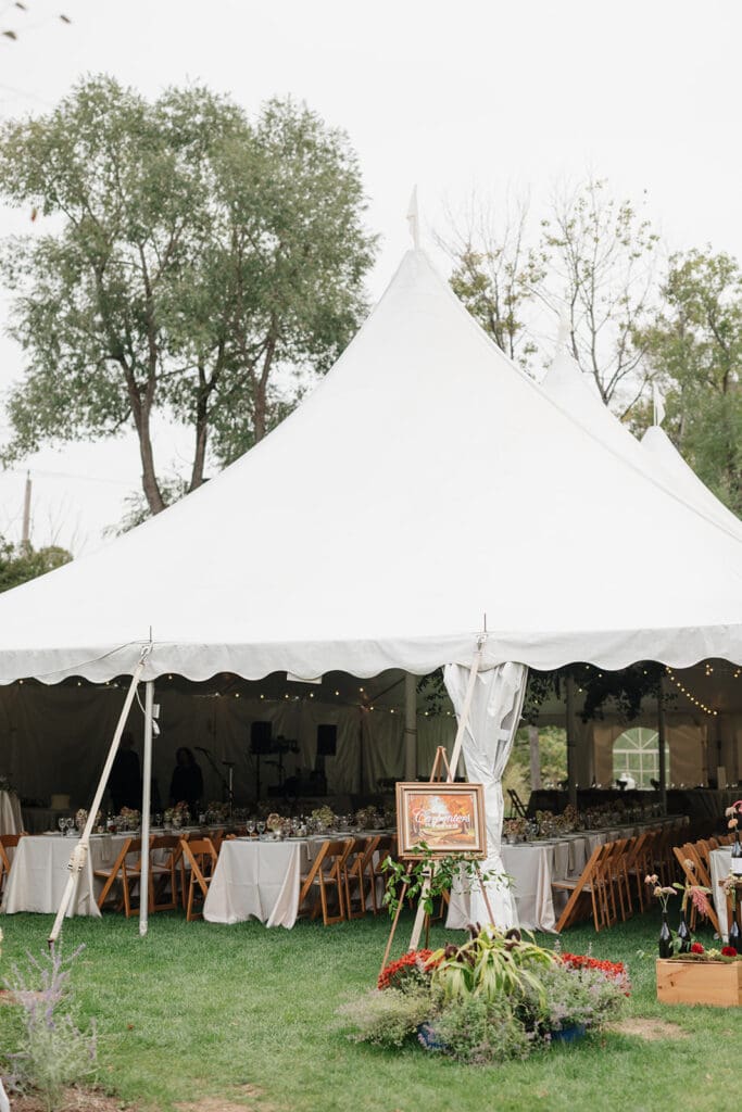 An outdoor tent set up for a wedding reception at the Barnstead Inn. 